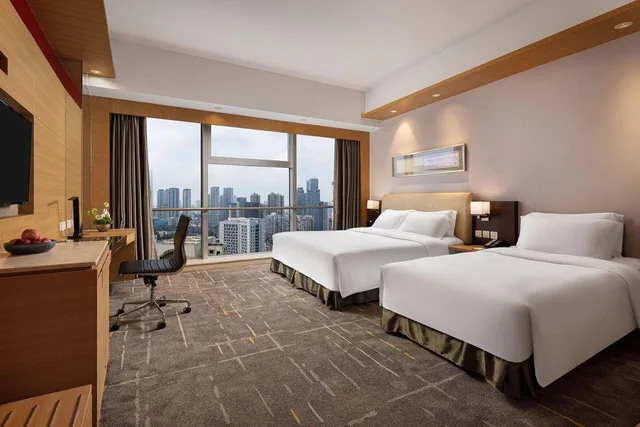 Comfy, Triple, 1 Queen and 1 Single Bed، New World Wuhan Hotel 1/1