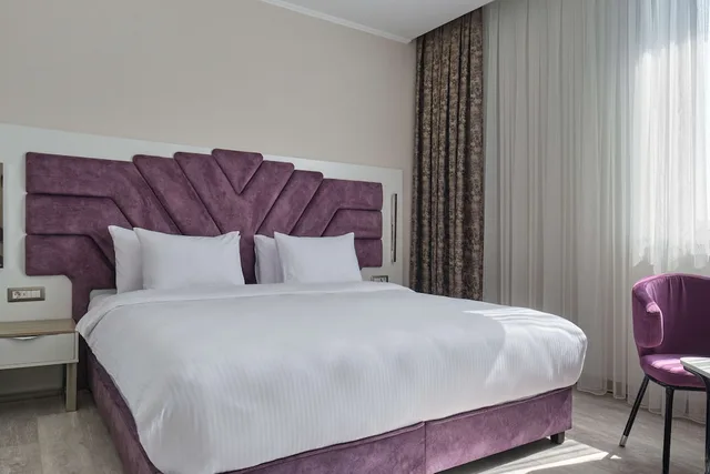 غرفة قياسية بسريرين منفصلين، Panarams Tashkent Hotel a Member of Radisson Individuals 3/7