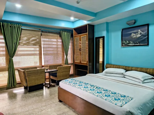 غرفة تنفيذية بسرير كينج، Rains Inn 1/10