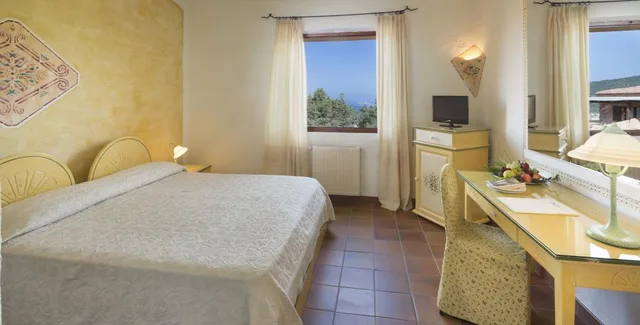 غرفة كلاسيكية بسرير كينج بإطلالة على الحديقة، Myo Hotel Rocce Sarde 5/7