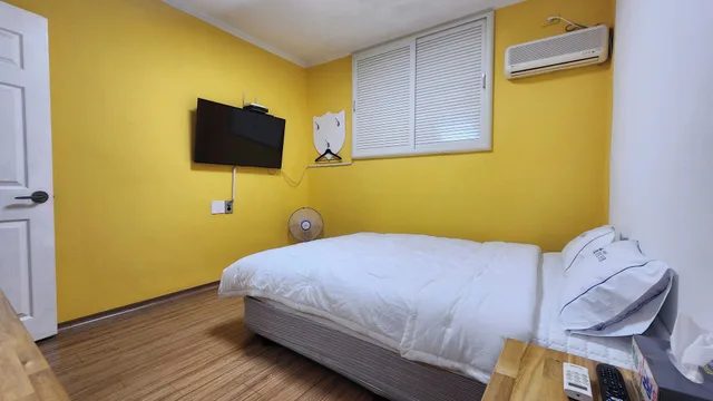 غرفة قياسية بسرير كوين، Myeongdong Motel 1/2