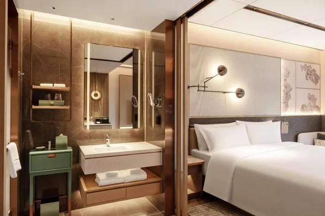 غرفة بسرير كينج بإطلالة على الحديقة، Suzhou Marriott Hotel Yangcheng Lake 3/4