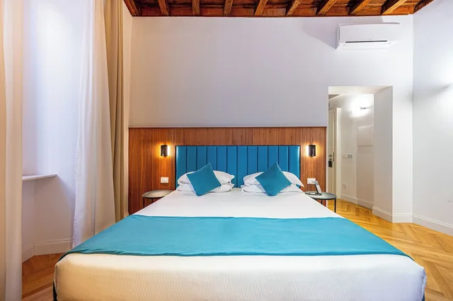 غرفة ديلوكس ثلاثية بسرير كينج وسرير فردي في الملحق، Albergo Abruzzi 2/9