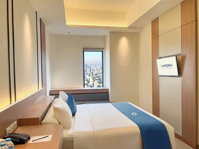غرفة مريحة ديلوكس بسرير كوين، LAMORA Kota Lama Surabaya 3/4