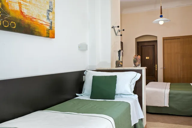 غرفة رباعية بسرير مزدوج وسريرين منفصلين، Hotel La Pensione Svizzera 2/3