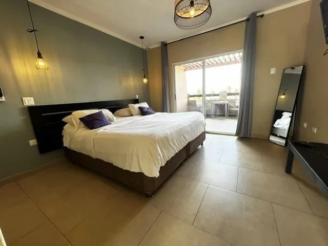 غرفة بسريرين منفصلين بشرفة، Eden Beach Resort 2/3