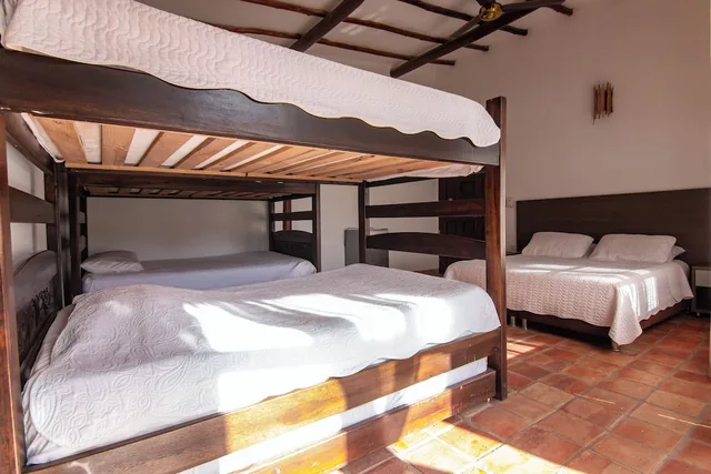 غرفة عائلية بأربعة أسرّة وسرير كوين بإطلالة على الحديقة، Hotel Portales del Tayrona by DOT Tradition 2/4