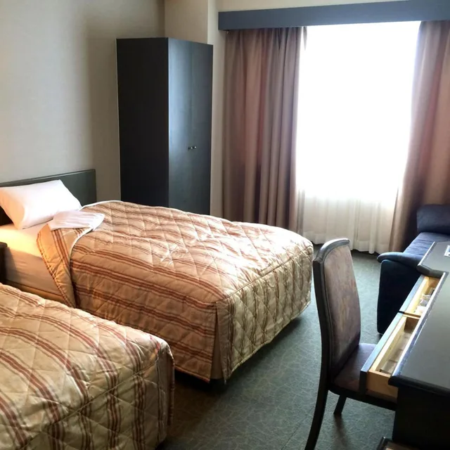 غرفة بسريرين منفصلين، Hotel Crown Hills Takaoka 2/5