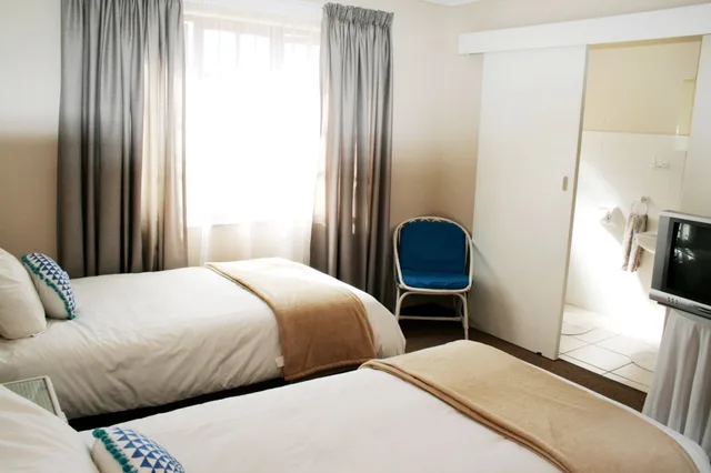 غرفة بسريرين منفصلين، Blouberg Dolphin Inn 3/6