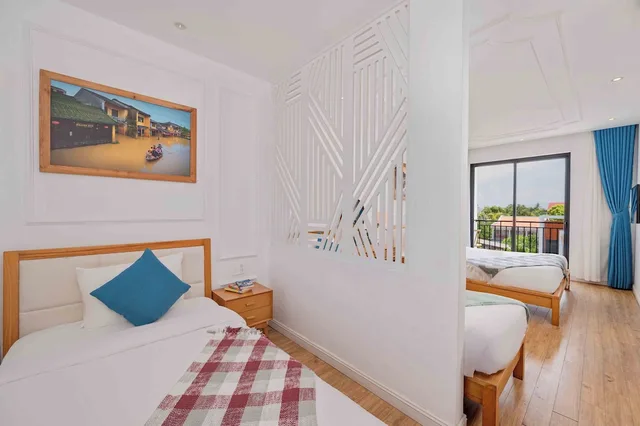 غرفة رباعية بسرير كينج وسريرين منفصلين، Lime Villa Hoi An 2/4