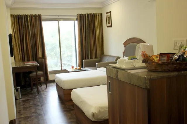 Deluxe, Twin Beds, Lords Eco Inn Gandhidham 2/3