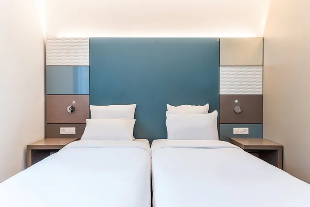 غرفة بسريرين منفصلين، B&B Hotel Lausanne Crissier 1/4