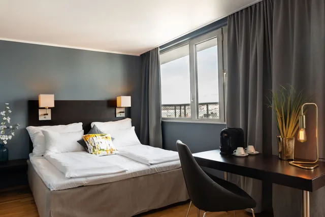 غرفة ديلوكس بسريرين منفصلين بشرفة مع أريكة، Quality Hotel Strand Gjovik 1/6