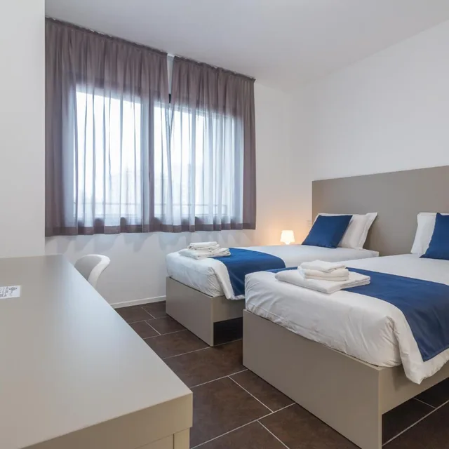 غرفة بسرير مزدوج أو سريرين منفصلين، Cascina Fossata Hotel Residence 3/10