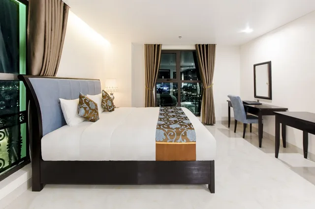 غرفة ديلوكس بسريرين منفصلين، Royal Quang Binh Hotel 1/3