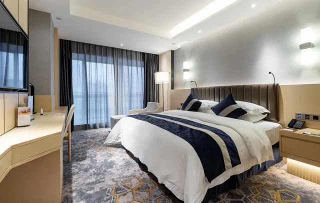 غرفة ديلوكس بسرير كينج بإطلالة على المدينة للمدخنين، Grand Metropark Hotel Liyuan Chongqing 3/8