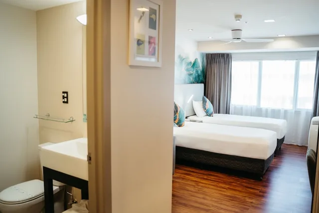 غرفة قياسية بسريرين منفصلين، Auckland City Hotel 7/7