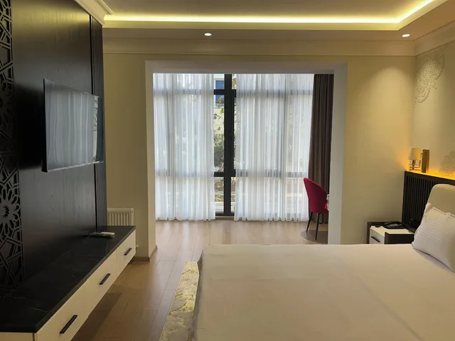 غرفة ديلوكس بسرير كوين، Hotel Ishonch 4/6