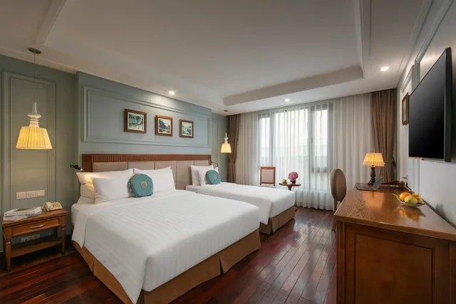 غرفة ديلوكس ثلاثية بسرير كوين وسرير فردي بإطلالة على المدينة، Hanoi Pearl Hotel 7/10