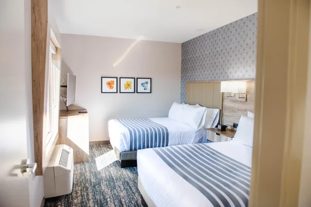 جناح عائلي بسريرين كوين مع أريكة، Best Western Premier Executive Residency Medicine Hat 5/10