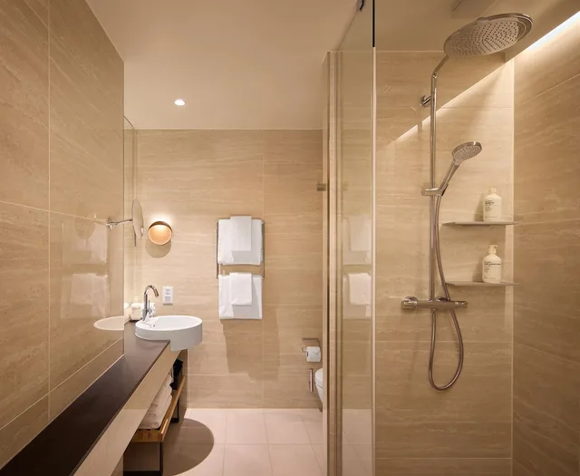 شقة بسرير كينج وسرير كوين بغرفتي نوم مع أريكة، Adina Apartment Hotel Geneva 5/6