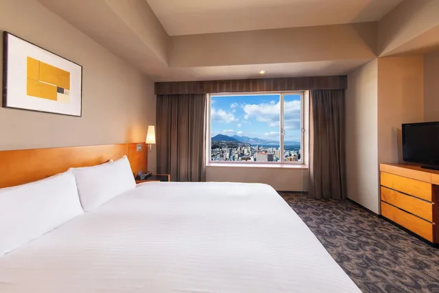 غرفة ديلوكس بسرير كوين، Hotel Nikko Oita Oasis Tower 1/6
