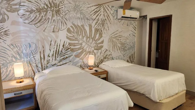 غرفة، Hotel Cocoplum Beach 2/4