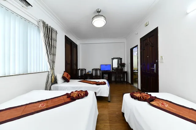 غرفة ديلوكس عائلية بسرير كوين وسرير فردي، Phoenix Legend Hotel 9/10