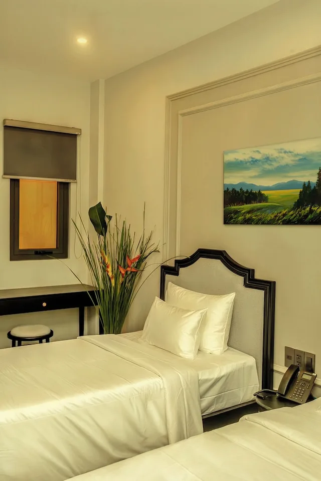 غرفة تنفيذية ثلاثية بسرير مزدوج وسرير فردي، Anvi Saigon Boutique Hotel 1/8