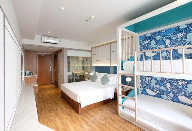 غرفة ديلوكس عائلية بسرير كينج وسرير بطابقين، Seaesta Hotel Nha Trang 3/4