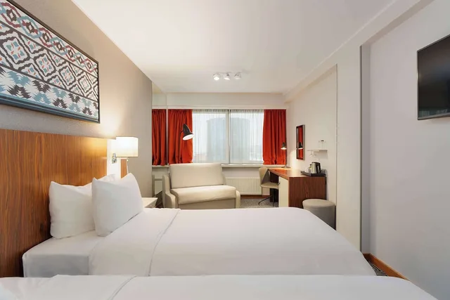 غرفة قياسية بسريرين منفصلين، Radisson Blu Olumpia 2/8