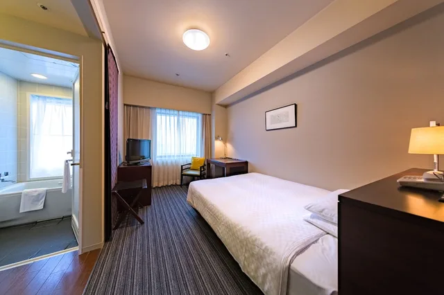 غرفة اقتصادية بسرير فردي للمدخنين، Centrair Hotel 1/2