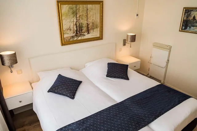 غرفة بسريرين منفصلين بحوض استحمام لذوي الإعاقة، Best Western Hotel Slenaken 1/3