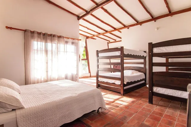 غرفة عائلية بأربعة أسرّة وسرير كوين بإطلالة على الحديقة، Hotel Portales del Tayrona by DOT Tradition 3/4