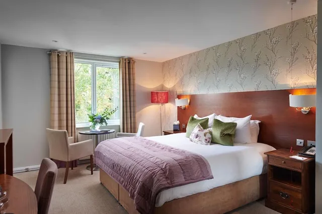 غرفة بسرير كينج بإطلالة على الحديقة، The Belsfield Hotel 1/1
