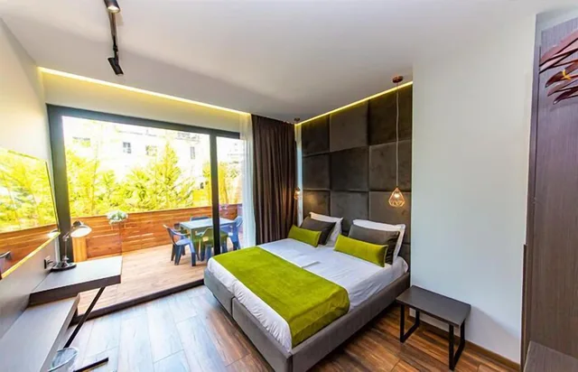 غرفة ديلوكس رباعية بسرير كوين وسريرين منفصلين بشرفة في الطابق الأرضي، Hotel Apollon 6/7