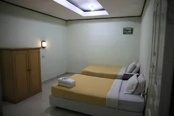 غرفة عائلية بإطلالة على البحيرة بغرفتي نوم بحمام خاص، Pandu Lakeside Hotel Parapat - Toba Lake 1/1