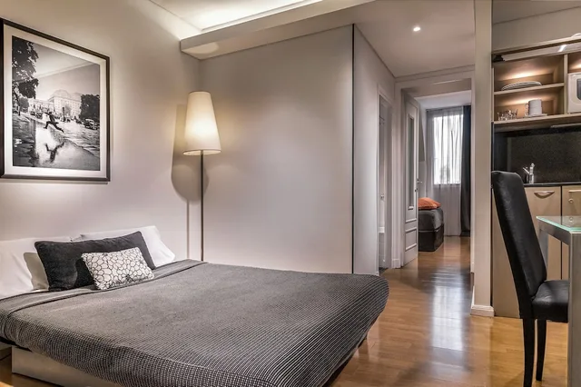 غرفة عائلية بسرير كوين مع أريكة، Broadway Hotel And Suites 1/4