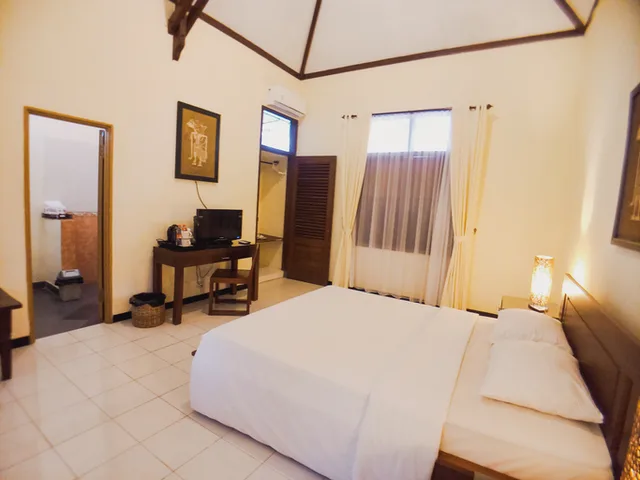بنغل بسرير مزدوج بإطلالة على الحديقة للمدخنين، Margo Utomo Hill View Resort 1/3