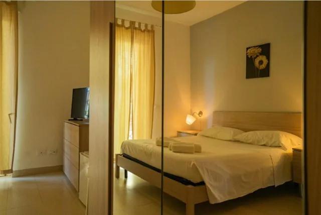 غرفة بسرير مزدوج أو سريرين منفصلين، Isa Fiumicino Airport Residence 1/10