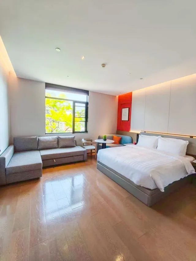غرفة ديلوكس رباعية بسرير كوين مع أريكة، SSAW Garden Hotel Beijing 1/4