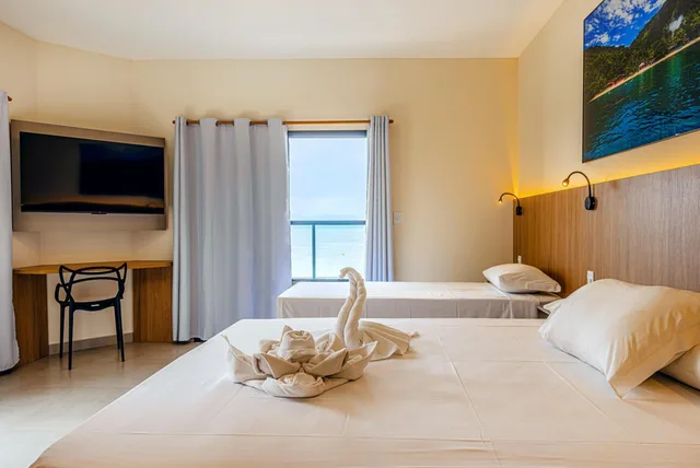 غرفة ديلوكس ثلاثية بسرير فردي بإطلالة على البحر، Ubatuba Praia Hotel 1/2