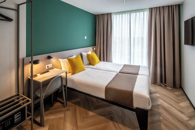 غرفة كومفورت بسريرين منفصلين بغرفة نوم واحدة، Hotel Fogo Amsterdam 1/5