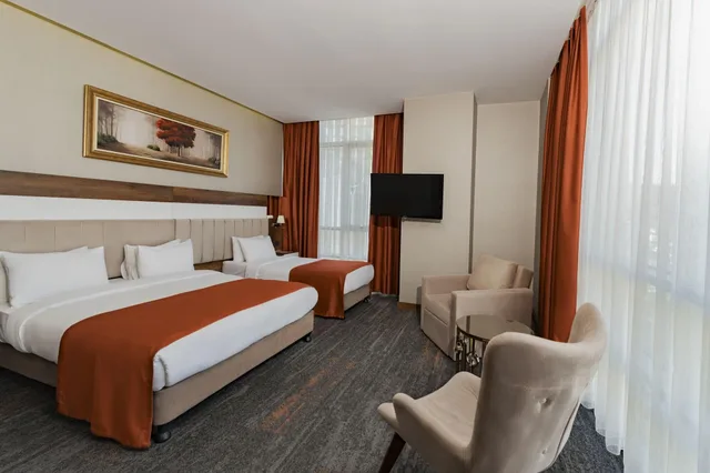 غرفة عائلية رباعية بغرفتي نوم للمدخنين، Vespia Hotel 5/8