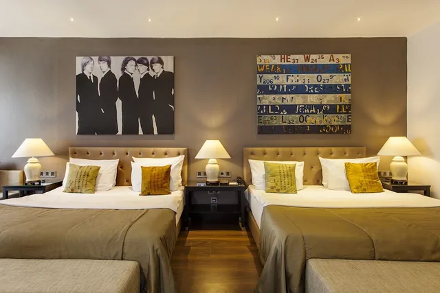 غرفة عائلية بسريرين كينج مع أريكة، Quentin Boutique Hotel 1/3