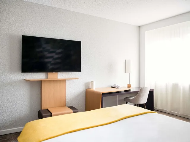 غرفة كلاسيكية بسرير مزدوج بإطلالة على الحديقة مع أريكة، Novotel Bordeaux Merignac 4/8