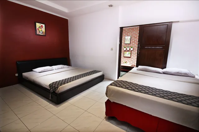 غرفة عائلية بسريرين كوين، Fora Guest House Taman Lingkar 1/2