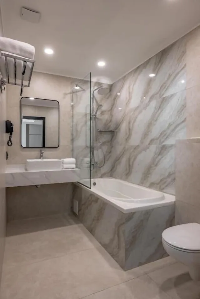 غرفة ديلوكس بسرير كينج وسريرين منفصلين بإطلالة على المدينة، Mountain View Residence Hotel 3/3