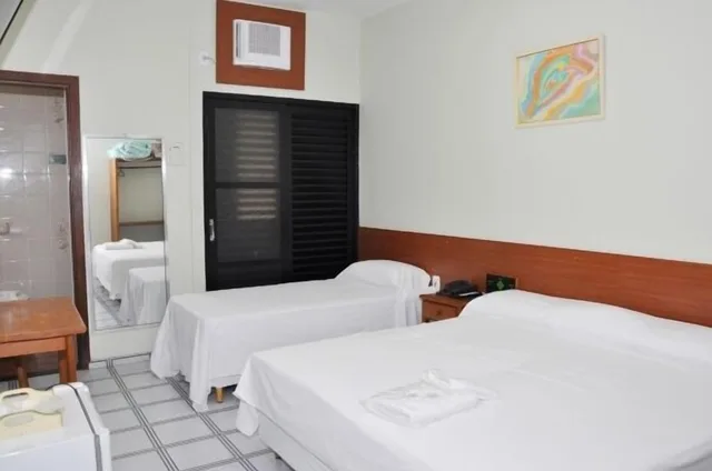 غرفة قياسية رباعية بسرير مزدوج وسريرين منفصلين، Carolina Plaza Hotel 6/7