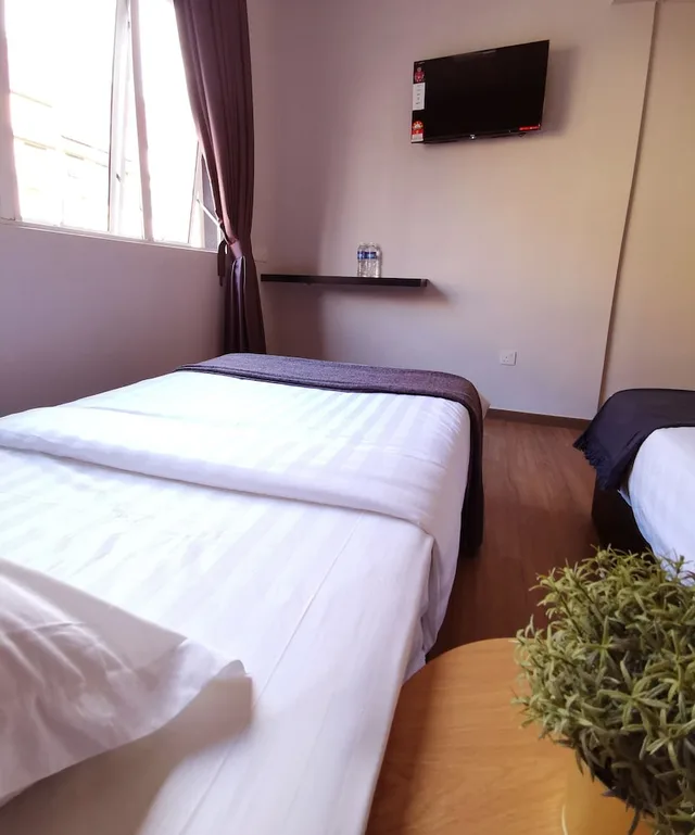 غرفة ديلوكس ثلاثية بسرير كينج وسرير فردي، The Core Hotel 3/4